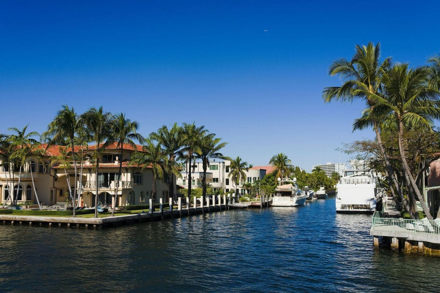 Waterfront homes and seawalls along a residential canal